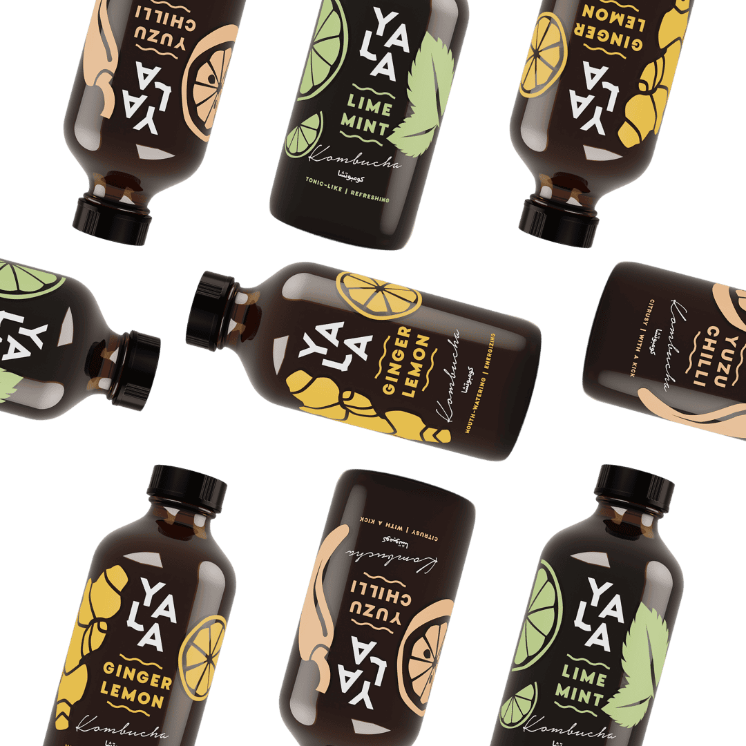 YALA kombucha 250ml glass bottles in Ginger Lemon, Lime Mint, and additional flavours displayed in grid layout
